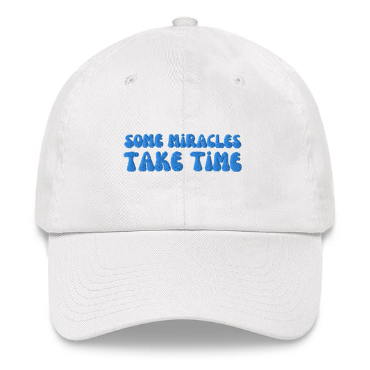 Some Miracles Take Time Cap